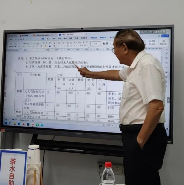 国基亿龙携手罗锡文院士，共探无人农场新征程